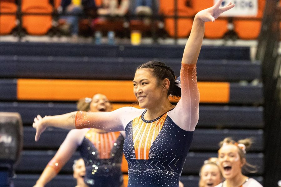 Junior Mia Takekawa poses at the end of her floor exercise routine during the competition against Central Michigan, Boise State, and Northern Illinois on March 4. Takekawa has played a major role for the team with recently being named the 2022 All-Team Big Ten. 