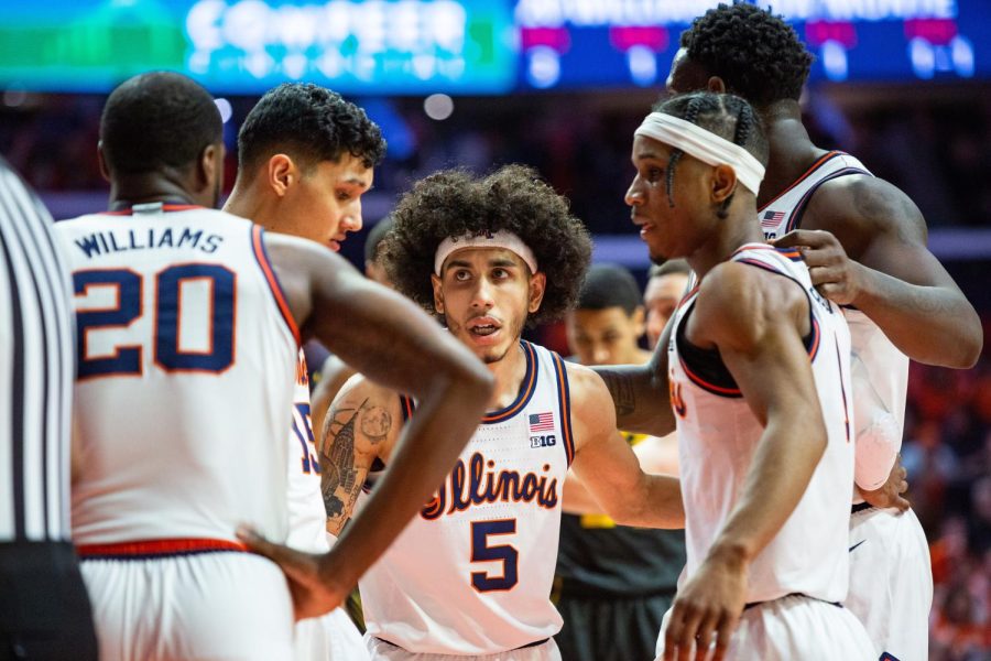 Andre Curbelo, Kofi Cockburn, Trent Frazier, RJ Melendez, and DaMonte Williams huddle together during the Big Ten Championship against Iowa on Sunday. The Illini will be up against Indiana for the Big Ten Tournament on Friday. 