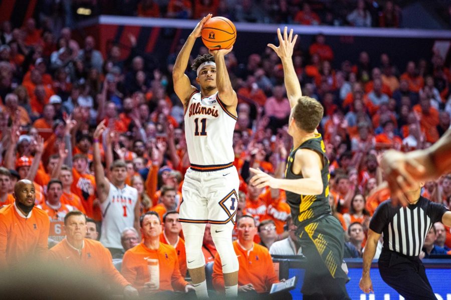 Graduate student guard Alfonso Plummer attempts a shot during Illinois 74-72 win over Iowa on Sunday at State Farm Center. Plummer earned Third-Team All-Big Ten honors, the conference announced on Tuesday.