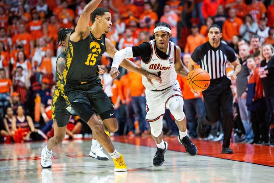 Fifth-year senior Trent Frazier dribbles with the ball during Illinois 74-72 win over Iowa on Sunday at State Farm Center. Frazier was named Seecond-Team All-Big Ten and to the conferences All-Defensive Team.