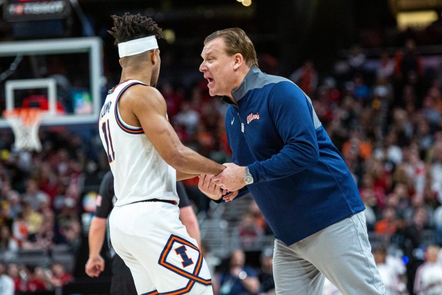 Head coach Brad Underwood grabs and yells at graduate student guard Alfonso Plummer during Illinois 65-63 loss to Indiana in the Big Ten tournament on Friday at Gainbridge Fieldhouse in Indianapolis. The offense struggled throughout the contest, and the team shot 35.7% from the field.