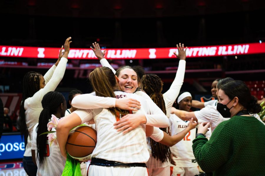 Forward Kendall Bostic hugs forward Geovanna Lopes during the senior ceremony after the game against Rutgers on Sunday. The Illini will be up against Wisconsin for the Big Ten Tournament on Wednesday. 

