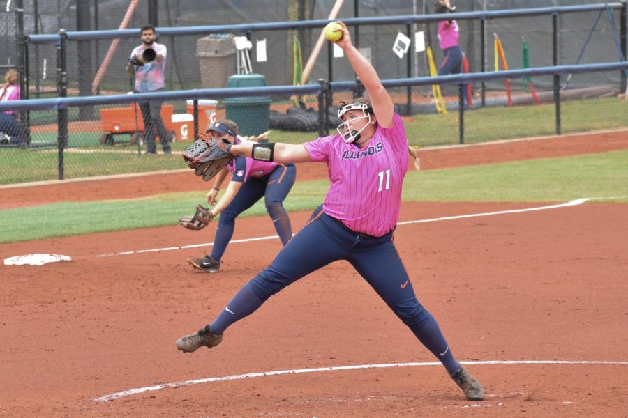 Pitcher Tori McQueen begins to pitch the ball during a game against UIS on Oct. 2. McQueen aided the Illini during seventh inning against Liberty and led to an Illini win 5-4.