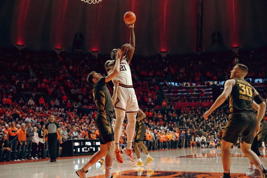 Junior center Kofi Cockburn goes up for a jumper during No. 20 Illinois mens basketballs game against No. 24 Iowa at State Farm Center on Sunday night.