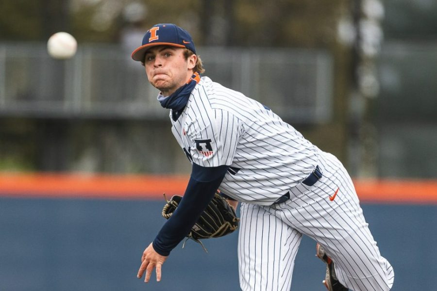 Left handed pitcher Payton Hutchings throws the ball during a game against Purdue on April 14. The Illini will be on the road for three games this weekend against Notre Dame, West Virginia and Kansas. 