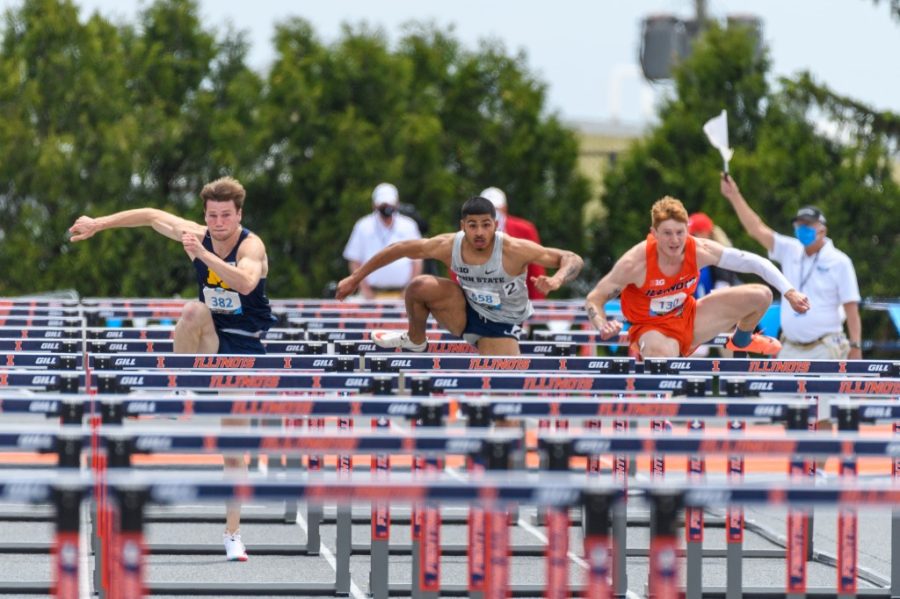 Senior Bret Dannis jumps over the hurdles during his 110m hurdle event for the Big Ten Track Outdoor Championship on May 16. Dannis placed second in the mens 100m for the Ole Miss Classic on Saturday. 