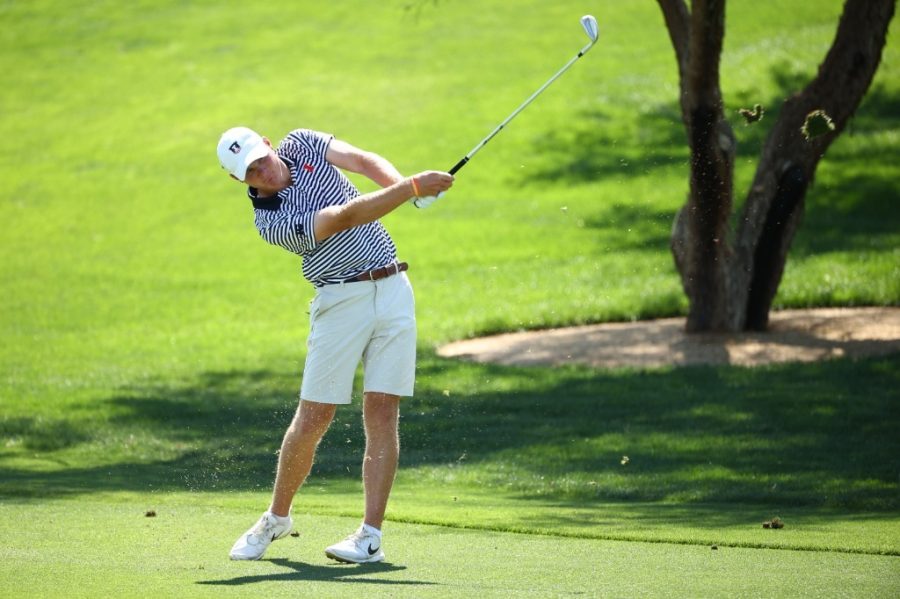 Senior Tommy Kuhl swings his club during the NCAA Championship on June 1. Kuhl finished the round shooting three-under during the Southern Highlands Collegiate. 