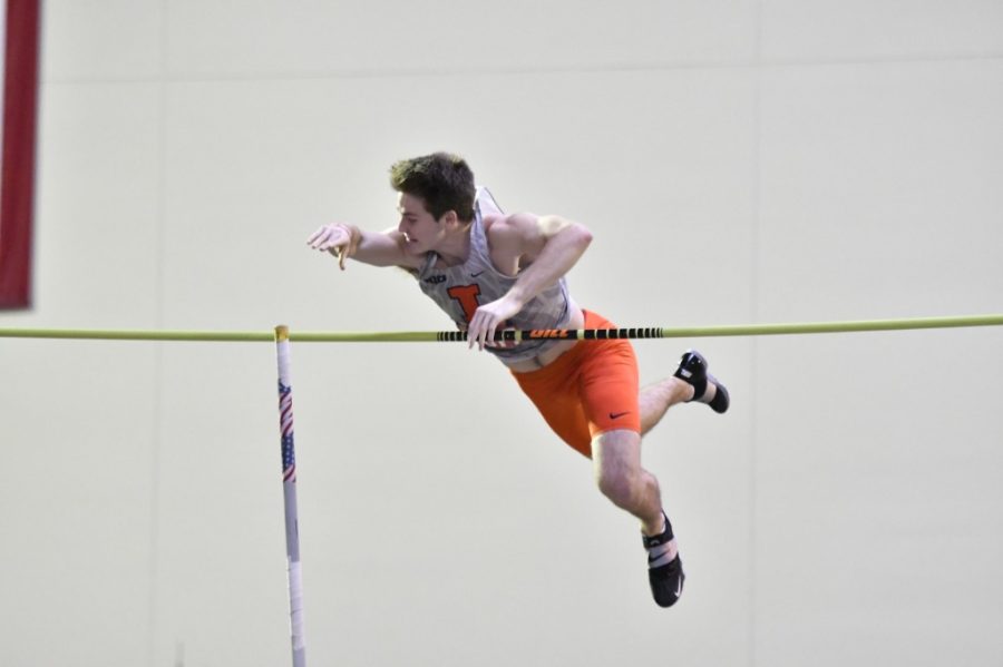 Junior Aiden Ouimet successfully goes over during his pole vault event during the Illini Invitational on Jan. 25, 2020. By not partaking in the NCAA Championships, Ouimet and the other athletes made time to prepare for the beginning of the outdoor track and field season.  