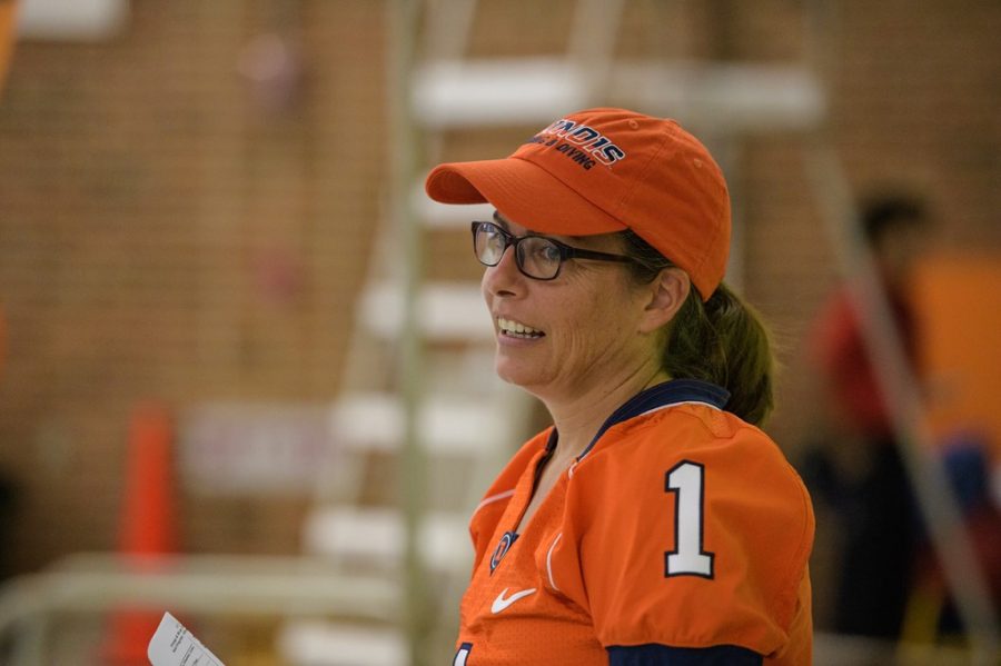 Illinois swim & dive head coach Sue Novitsky watches an event during the Orange and Blue meet on Sept. 29, 2018. During Novitskys 28 years of coaching she has had 16 swimmers go to the NCAA Championships.