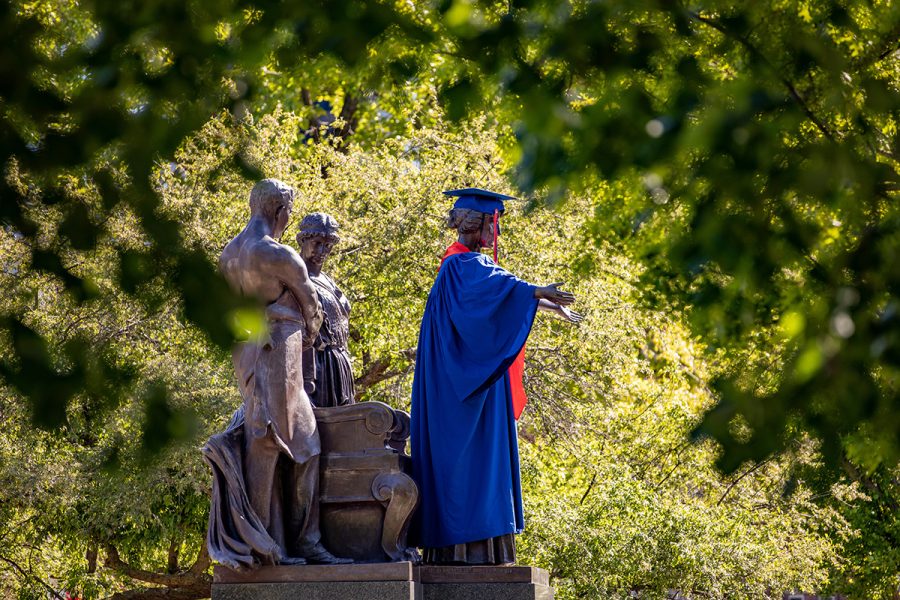 Alma is covered in a full graduation regalia for the commencement in May 2021. This years commencement will be happening in person following the pandemic. 