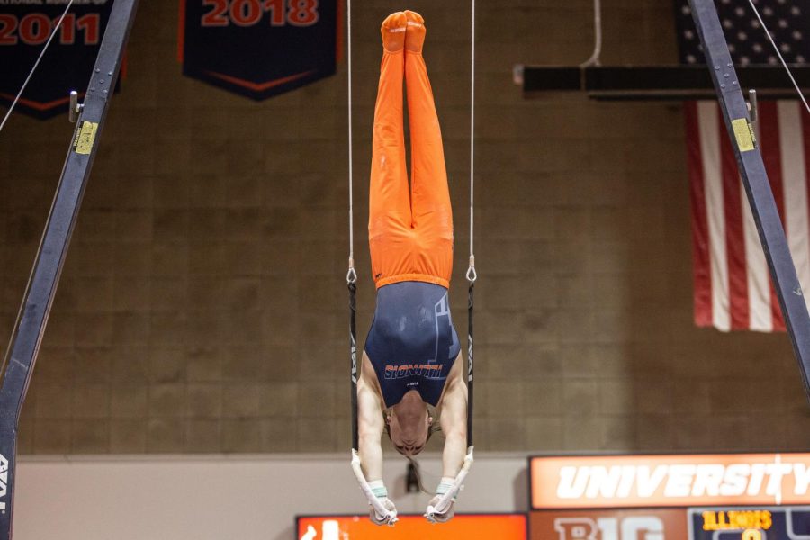 Junior Ashton Anaya steadies himself during his still ring event during the competition against Oklahoma on Feb. 12. The Illini will be competing in Oklahoma this Friday for the NCAA Championships. 
