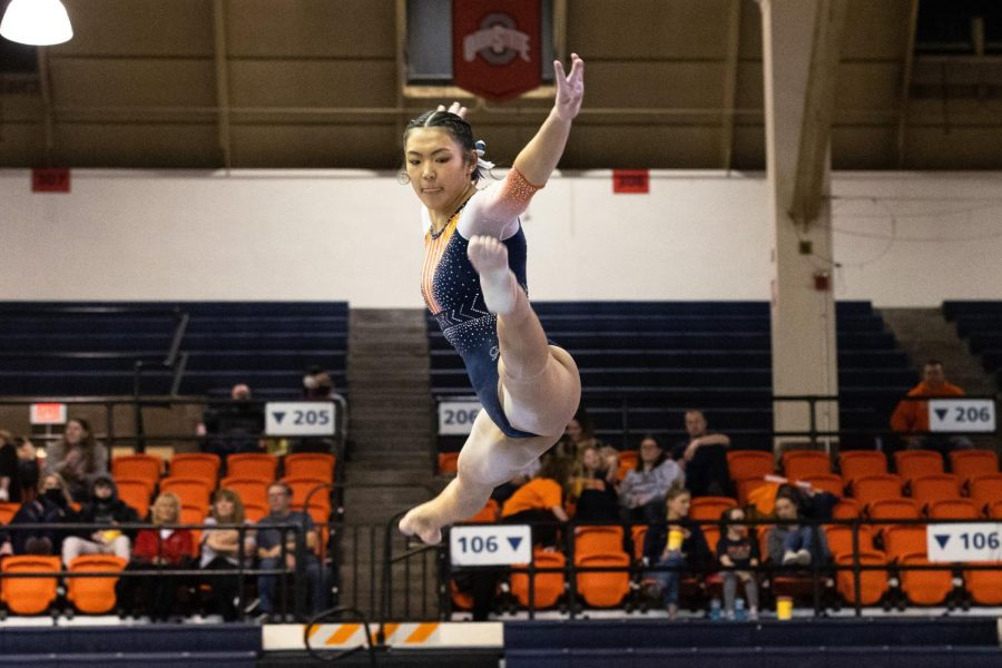 Junior Mia Takekawa performs her beam routine during the competition against Central Michigan, Boise State, and Northern Illinois on March 4. Takekawa scored 9.950 for bars during the NCAA Regionals on Thursday, and the Illini overall placing fourth. 