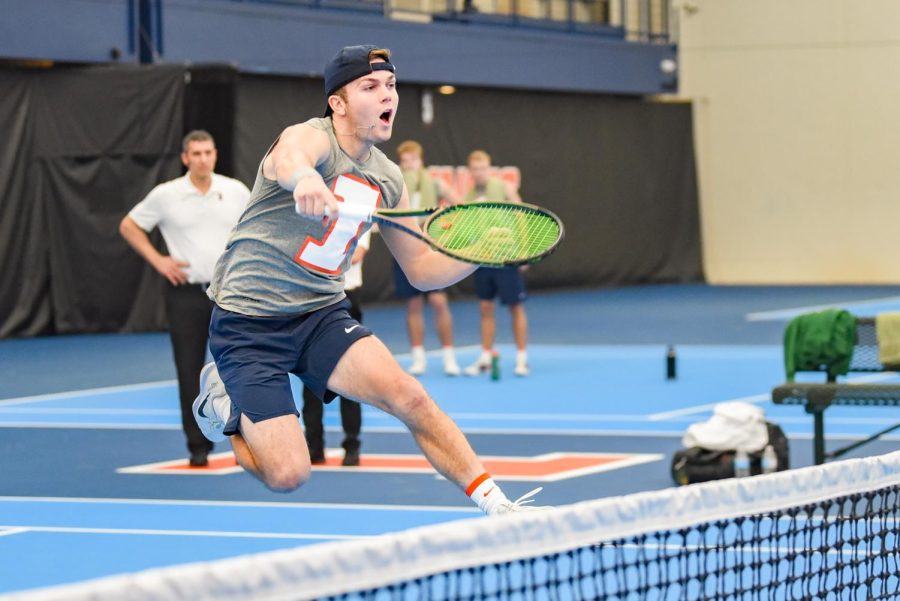Redshirt sophomore Lucas Horve hits the ball to Baylors side during his doubles match with partner sophomore Hunter Heck on March 4. Horve and Heck won their doubles match against Michigan State 6-0 on Sunday, and the the Illini winning overall 6-1. 