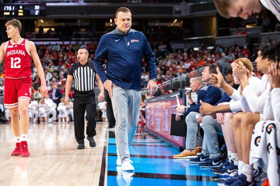 Illinois mens basketball head coach Brad Underwood walks alongside the sidelines during the Big Ten Tournament game against Indiana on March 11. Underwood has shown excitement for the incoming freshman players such as guards Jayden Epps and Skyy Clark. 