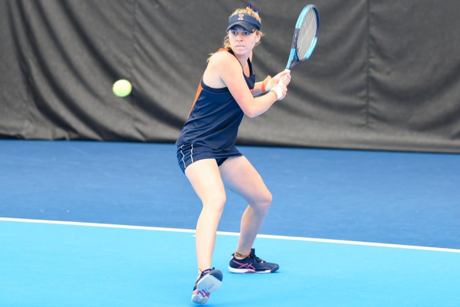 Junior Josie Fraizer eyes the ball during her singles match against Rutgers on March 27. The Illini will be hosting for Purdue on Friday and Penn State on Sunday.  