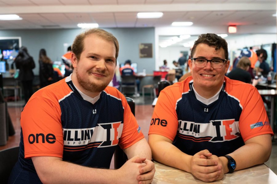 Illini+Esports+President+and+ACES+research+assistant%2C+AJ+Taylor+and+Illini+Esports+community+director+Alec+Forest-Pierson+discuss+hosting+a+LAN+party+at+the+Union+on+Saturday+which+consisted+of+cosplay+contests+and+raffles+among+the+many+games+being+played.