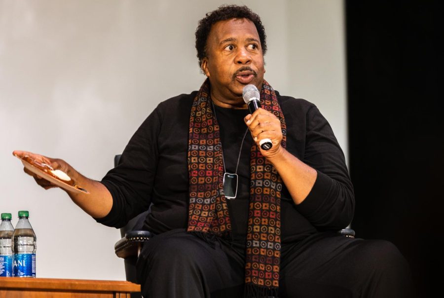 Leslie David Baker holds a pretzel given by a fan during “The Office” Q&A event on Monday. Baker shared his past career choices before becoming an actor and starring in the hit TV show “The Office.”