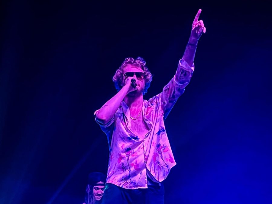 Rapper Yung Gravy speaks to the audience before performing his song Oops during the Spring Jam at State Farm Center on Sunday. Yung Gravy performed many other of his hits such as Mr. Clean and Gravy Train.