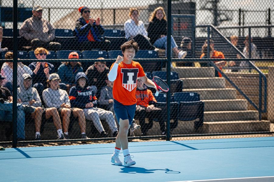 Sophomore Hunter Heck celebrates a point won during the competition against Michigan State on Sunday. Heck has moved up to No. 74 after winning his match against Michigan. 
