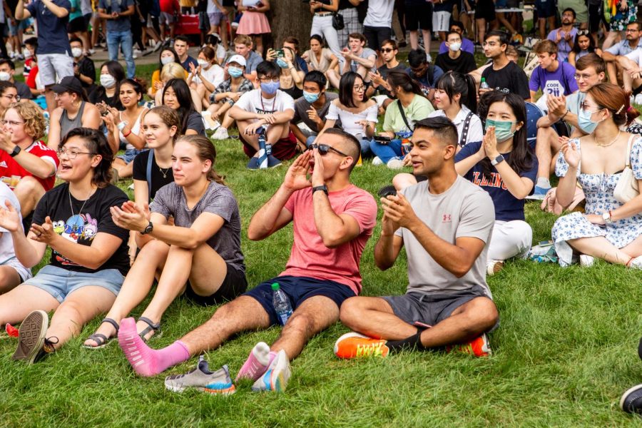 Students cluster together and cheer on the main quad during Quad Day on Aug 22. For the upcoming sesmester, the University needs to clarify and fix the inconsistences when it comes to Covid-19 on campus. 
