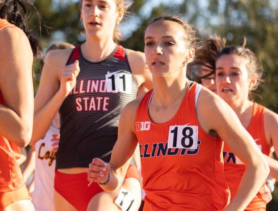 Distance Runner Halle Hill pushes forward to maintain position at the front of the race during the track Illini Classic on April 9. Hill was able to participate in the NCAA postseason regional as a freshman within the 1500m but was unable to place for finals.