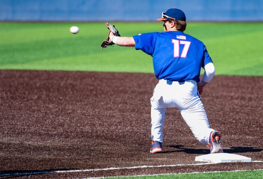 Sophomore Justin Janas catches the ball at first base during the game against Miami Ohio on Saturday. The Illini will be up against Nebraska for their last home games of the regular season from Friday to Saturday. 