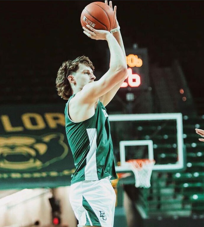 Recent Illinois basketball commit Matthew Mayer gets into position to make a shot at the hoop at the Ferrel Center in Baylor University.
Past Baylor University guard/forward Mayer took to social media on Friday with an announcement that he will be pursuing the court with Illini basketball as a newly commit athlete to the team this upcoming 2022-2023 season.