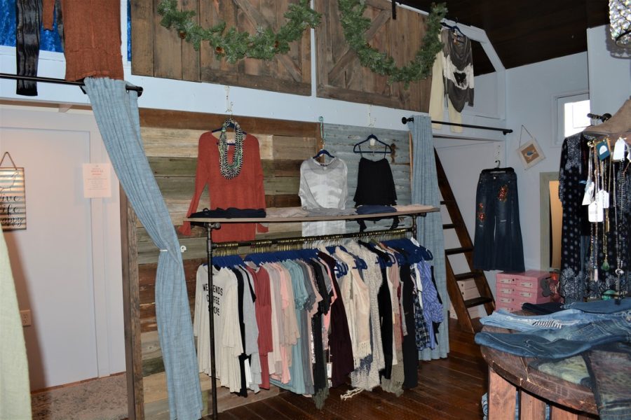 A rack of clothes displayed at the bluebird boutique. The local business obtains clothes through wholesale markets with the included bonus of meeting and learning from other vendors. 