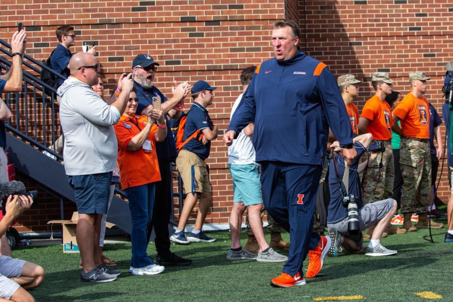 Illinois football head coach Bret Bielema enters the field at Memorial Stadium before the Homecoming game against Wisconsin on Oct. 9. The team was able to secure four commitments during their 2023 recruiting class.