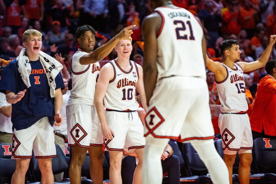 The+Illinois+Mens+Basketball+team+cheer+and+celebrate+from+the+sidelines+during+the+Big+Ten+Championship+game+against+Iowa+on+March+6.+The+team+has+recruited+seven+4-star+recruits+for+the+upcoming+2022-2023+season.+