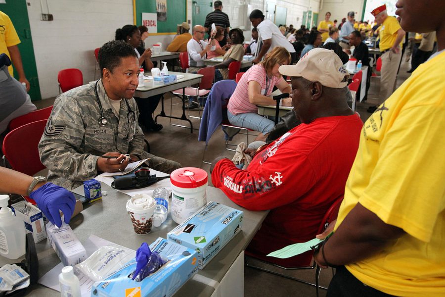 Sgt. Jamal J. Hogan takes the medical information of a homeless veteran during Stand Down 2012, an event that aids homeless veterans such as mental health screenings, on Sept. 28, 2012. Opinions Editor Aparna Lakkaraju argues that the mental health of veterans continues to be an issue that is ignored. 
