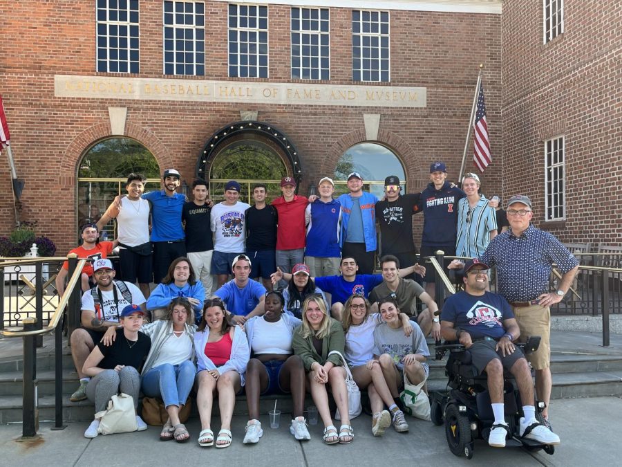 Professor Michael Raycraft and his RST 180: Professional Applications class stand in front of the National Baseball Hall of Fame and Museum in Cooperstown, NY during their trip around the Northeast from May 23 to June 3. 