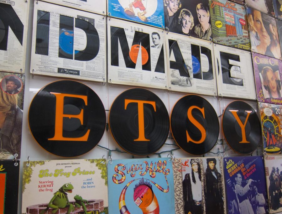 The Etsy logo displayed on record vinyls at the Etsy headquarters in Brooklyn on March 23, 2011. Columnist Maggie Knutte believes that online shopping provides a better outlet for small businesses. 