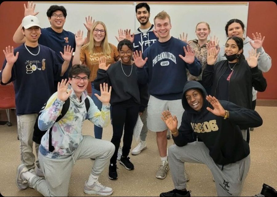 Members of the Illini Transfer Ambassadors pose for a picture during their final meeting last year. Students discuss the trials and tribulations of being a transfer.
