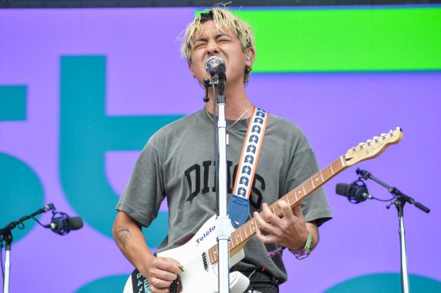 Sean Caskey, lead vocalist of The Last Dinosaurs, sings during their set at Lollapalooza on Thursday at the Bud Light Seltzer stage. The group will release their new LP “From Mexico With Love in November. 
