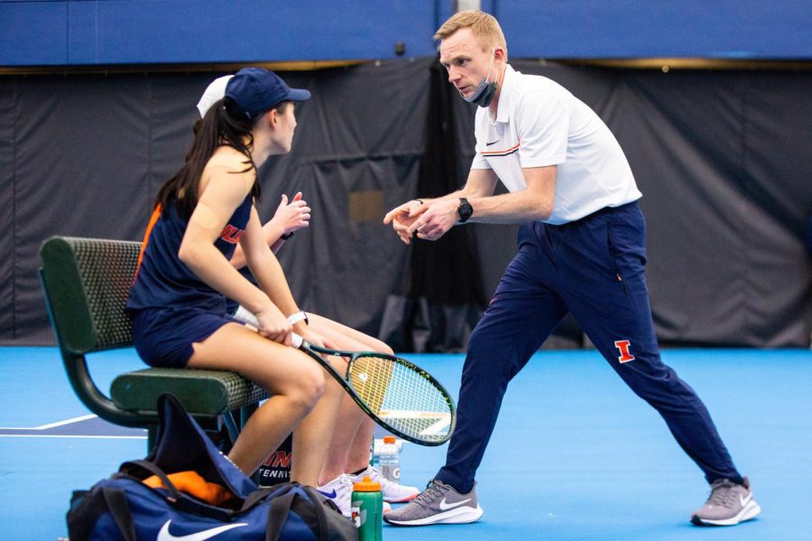 Womens+Tennis+head+coach+Evan+Clark+heads+over+to+have+a+quick+chat+with+athletes+on+Feb.+6%2C+2021.+Clark+opens+up+about+the+team+not+being+found+on+the+upcoming+NCAA+tournament+and+taking+advantage+of+the+upcoming+season+to+continue+to+improve.+
