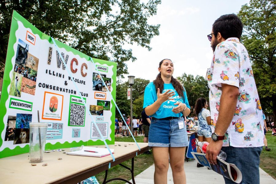 An Illini Wildlife & Conservation Club member talks to a student during Quad Day on Aug. 22, 2021. The University provides a wide array of RSOs that provide high energy or relaxing groups. 