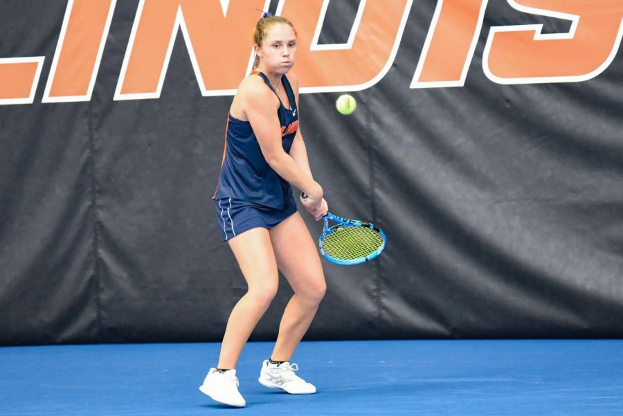 Sophomore Kasia Treiber prepares to hit the ball during her singles match against Rutgers on March 27. Treiber feels more confident and prepared for her second year on the Illinois women’s tennis team compared to her previous season. 
