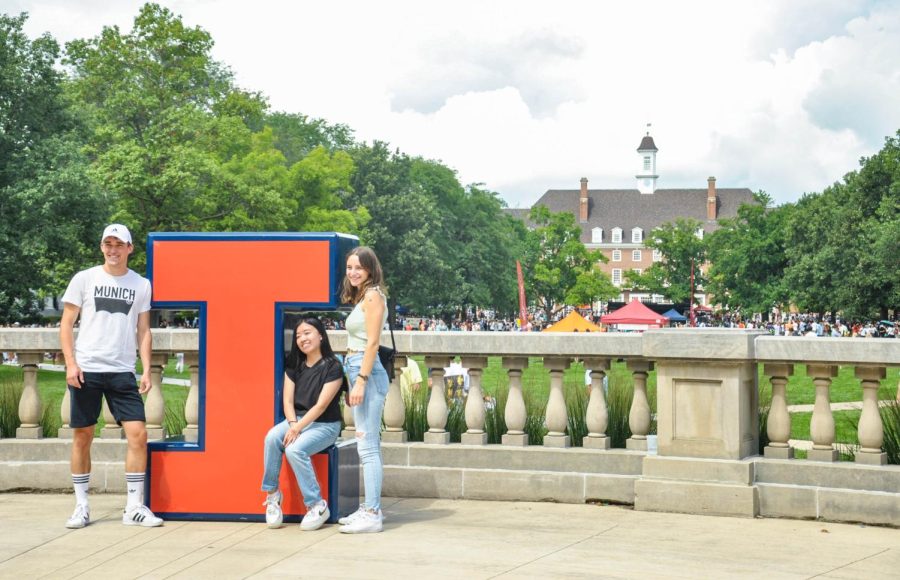 Students pose with the Block I logo in front of Foellinger Auditorium during Quad Day on Aug 21. 