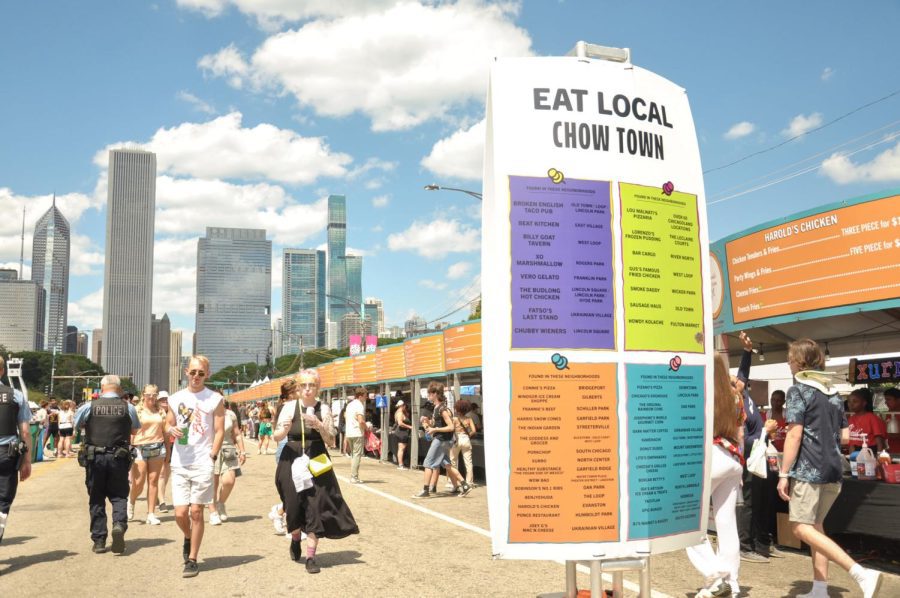 Lollapalooza festivalgoers line up at the food station on Sunday featuring many local, Chicago foods. More than 40 Chicago restaurants were featured at the festival including The Billy Goat Tavern, Cheesies Pub & Grub and more. 
