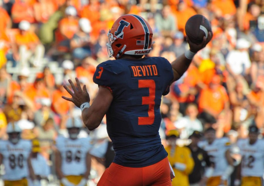 Senior quarterback Tommy DeVito goes to throw the ball during the game against Wyoming on Aug. 27. 