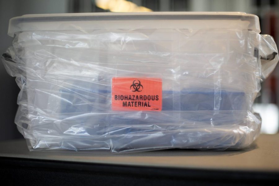 A container filled with COVID-19 PCR test samples at the State Farm Center COVID-19 testing site on Oct. 9 2020. Columnist Micky Horstman believes that online classes negatively impact students learning. 