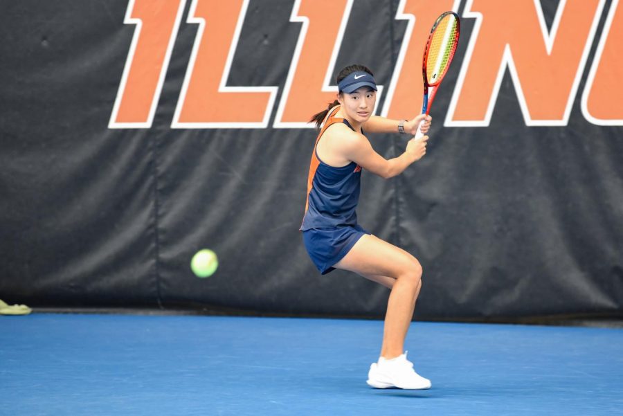 Senior+Ashley+Yeah+readies+to+hit+the+ball+during+her+match+against+Rutgers+on+March+27.+Yeah+was+one+of+four+Illinois+womens+tennis+players+to+attend+the+Wahoowa+Invite+in+Virginia+this+past+weekend.+