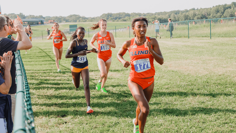 Senior+Olivia+Howell+leads+the+race+during+the+John+McNichols+Invitational+on+Saturday.+The+Illini+took+an+outstanding+victory+on+Saturdays+Cross+Country+match%2C+with+Howells+17%3A17+finish+becoming+the+highlight+of+the+event.