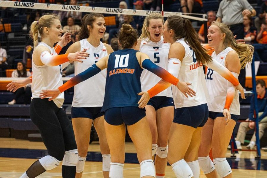 The Illinois volleyball team celebrate during the scrimmage against Brøndby Volleyball Klub on March 9. The Illini will be up against Colorado on Saturday and then Washington on Sunday.