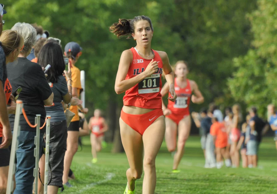 Graduate student Emma Milburn runs during the Illini Challenge against Illinois State on Sept. 1. 