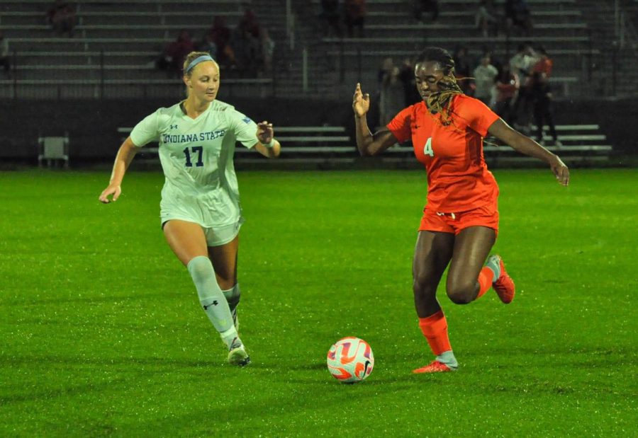 Junior forward Makala Woods dribbles the ball past Indiana State on Sept. 4.