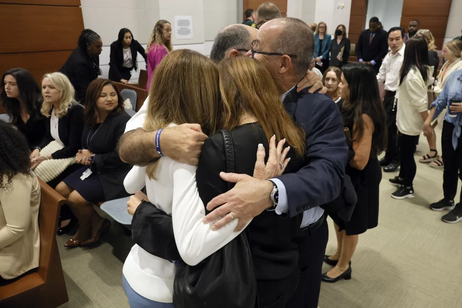 Linda Beigel Schulman, Michael Schulman, Patricia Padauy Oliver and Fred Guttenberg, all family members of the victims killed by the Parkland shooter, in the courtroom to hear the verdict in the sentencing trial on Oct. 14.