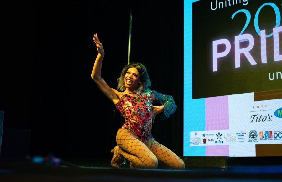 CJ Brown, also known as Karma Carrington, performs to music during Uniting Prides drag show at Canopy Club on Thursday. Brown opened up about drag as well as how it has assisted towards them experimenting with their gender identity and stage performance.