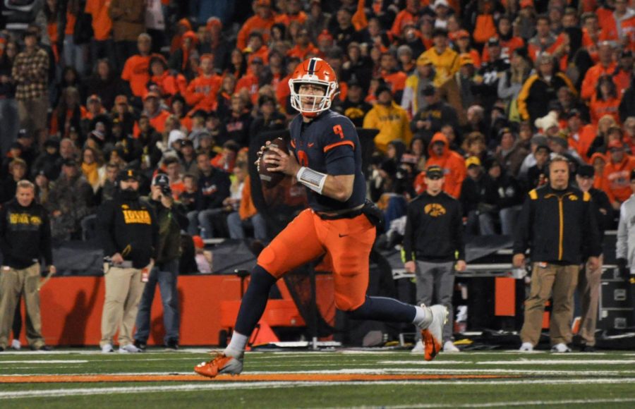 Junior quaterback Artur Sitkowski looks to pass the ball during the game against Iowa on Oct. 8. 